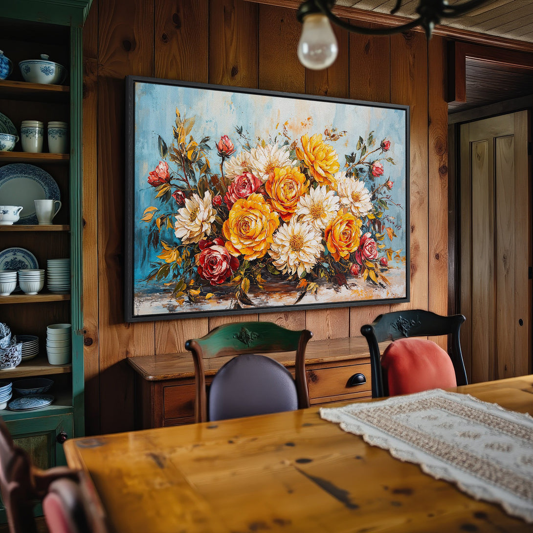 Framed Wall Art: Floral painting in a rustic dining room. Features yellow, red, and white flowers against a blue background. Adds warmth & style to any space!