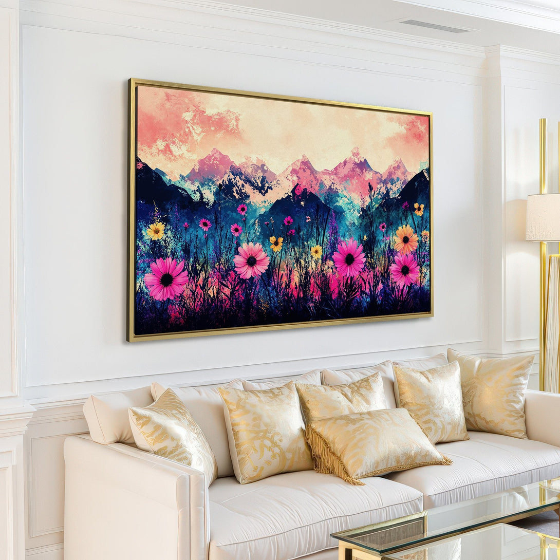 Canvas Print of a vibrant floral and mountain landscape painting in a modern living room. Pink, purple, and yellow color palette.