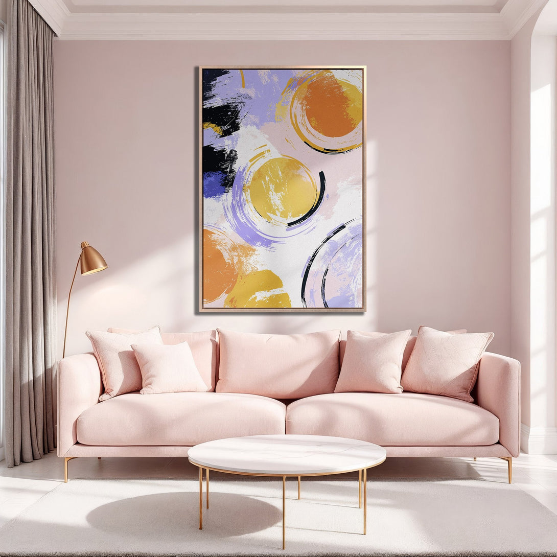 Framed Wall Art featuring abstract circles in a modern style. Beautiful pastel color palette of pink, yellow, and purple. Perfect for home decor!
