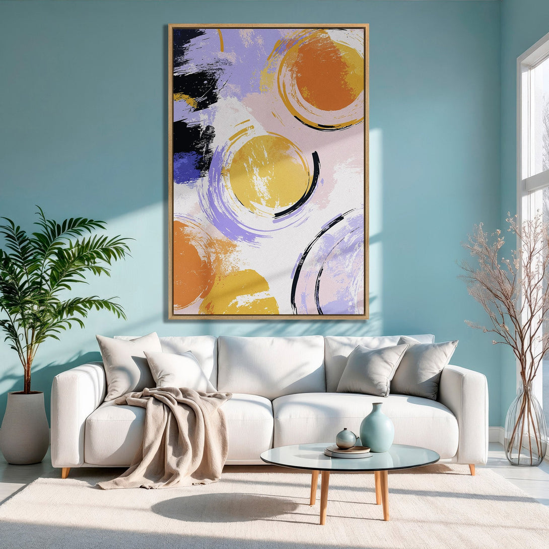 Framed Wall Art: Abstract circles in orange, yellow, and purple. Modern art canvas print adds a pop of color to any living room.