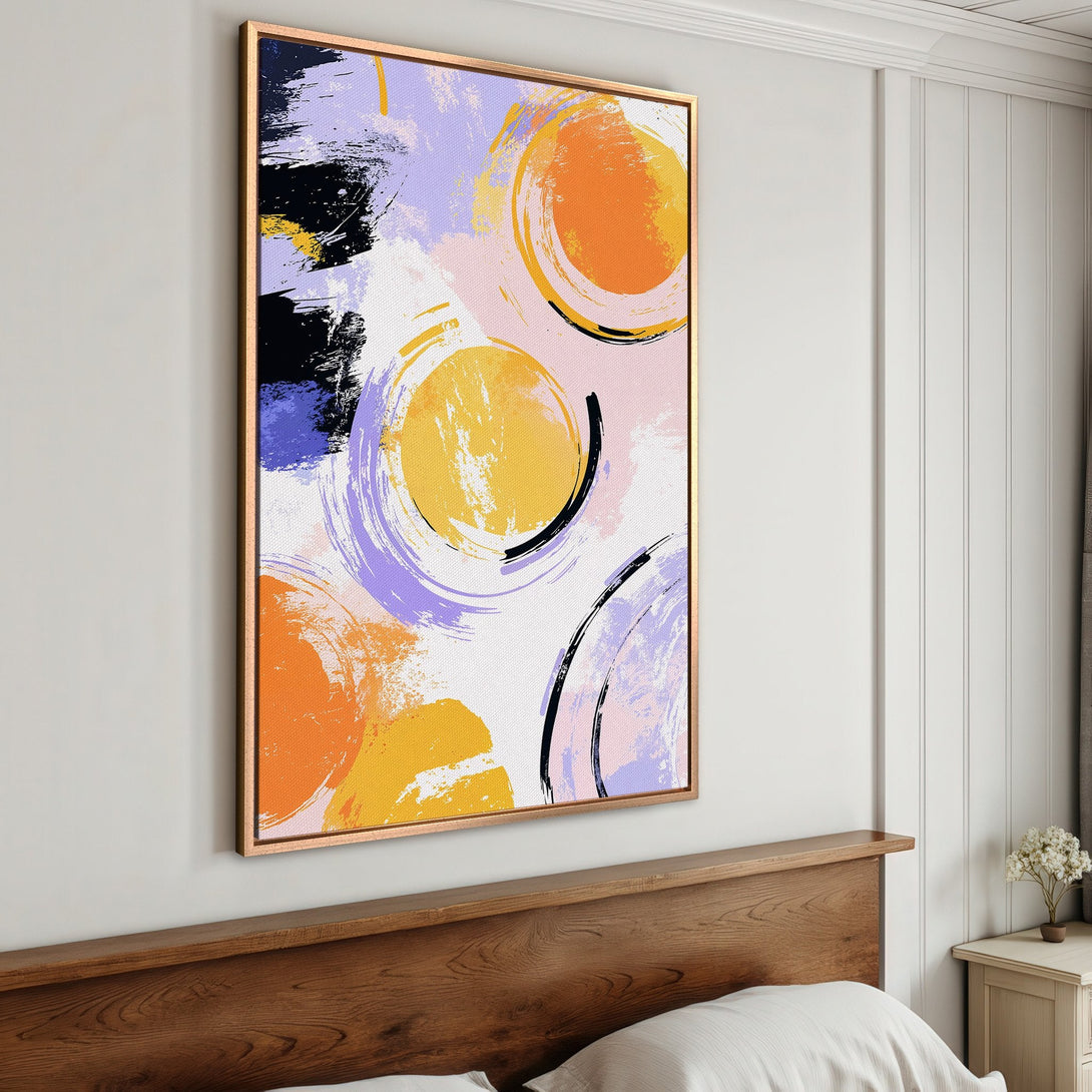 Framed Wall Art: Abstract art print in a bedroom. Features a colorful palette of orange, yellow, purple, and black brushstrokes. Modern decor for your space.