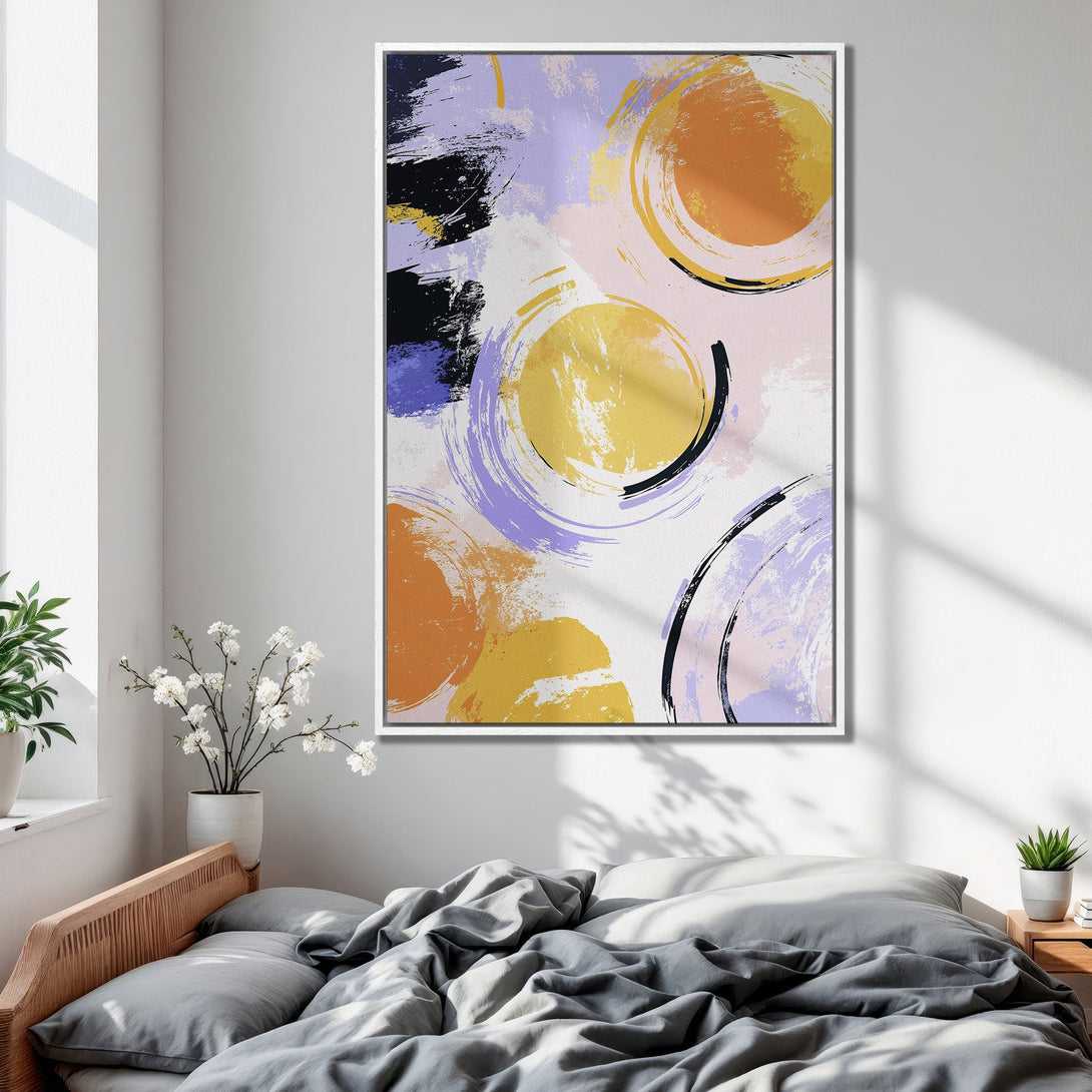 Framed Wall Art featuring abstract brushstroke circles in a modern style. This colorful Canvas Print uses a palette of yellow, orange, purple, and black. Perfect bedroom decor!