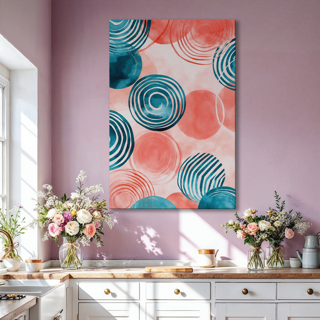 Framed Wall Art featuring abstract circles in teal and coral. Modern art canvas print adds a pop of color to any interior.