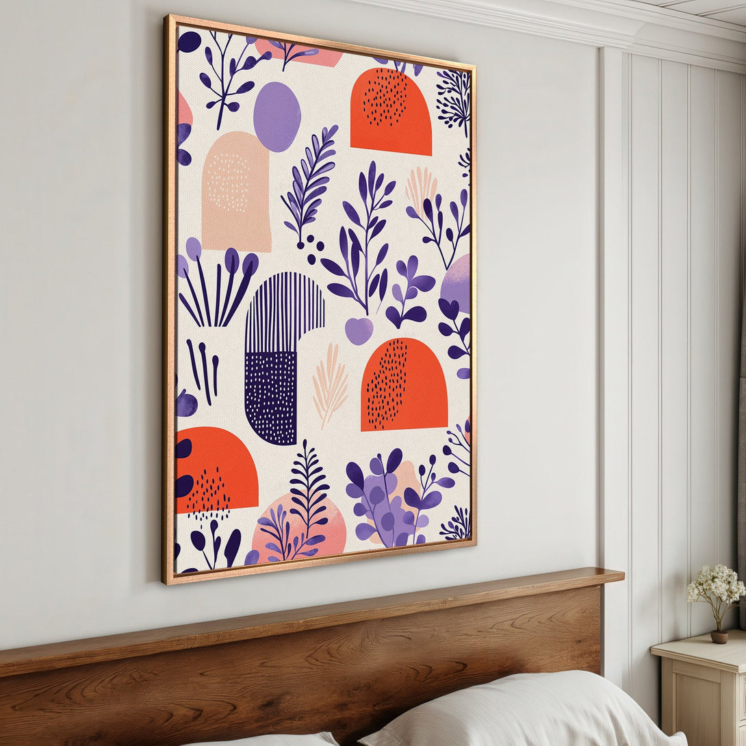 Framed Wall Art featuring a modern botanical design in a vibrant color palette of orange, purple, and pink. Perfect for adding a pop of color to any space!