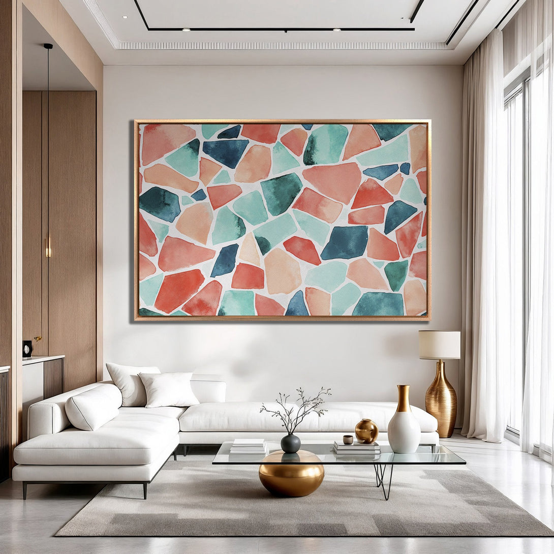 Framed Wall Art: Abstract watercolor art in a modern living room. Features a colorful palette of coral, teal, and navy, adding a pop of color.