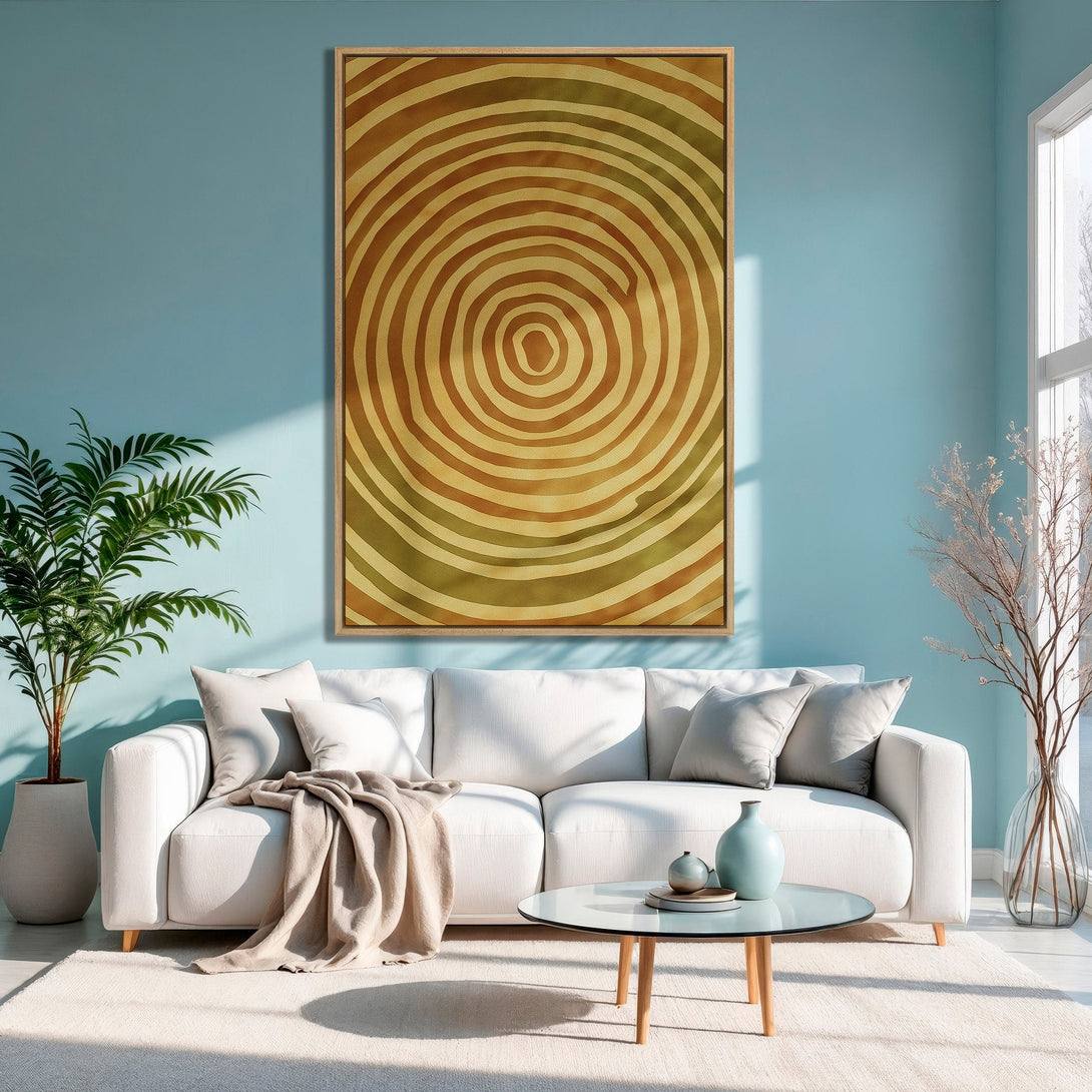 Framed Wall Art featuring abstract spiral design in warm earth tones, perfect for adding a touch of modern style to your living room.