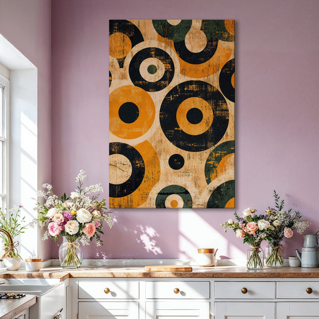 Framed Wall Art featuring an abstract geometric design with circles in a warm, earthy palette of mustard yellow, black, and green. Perfect for modern interiors.