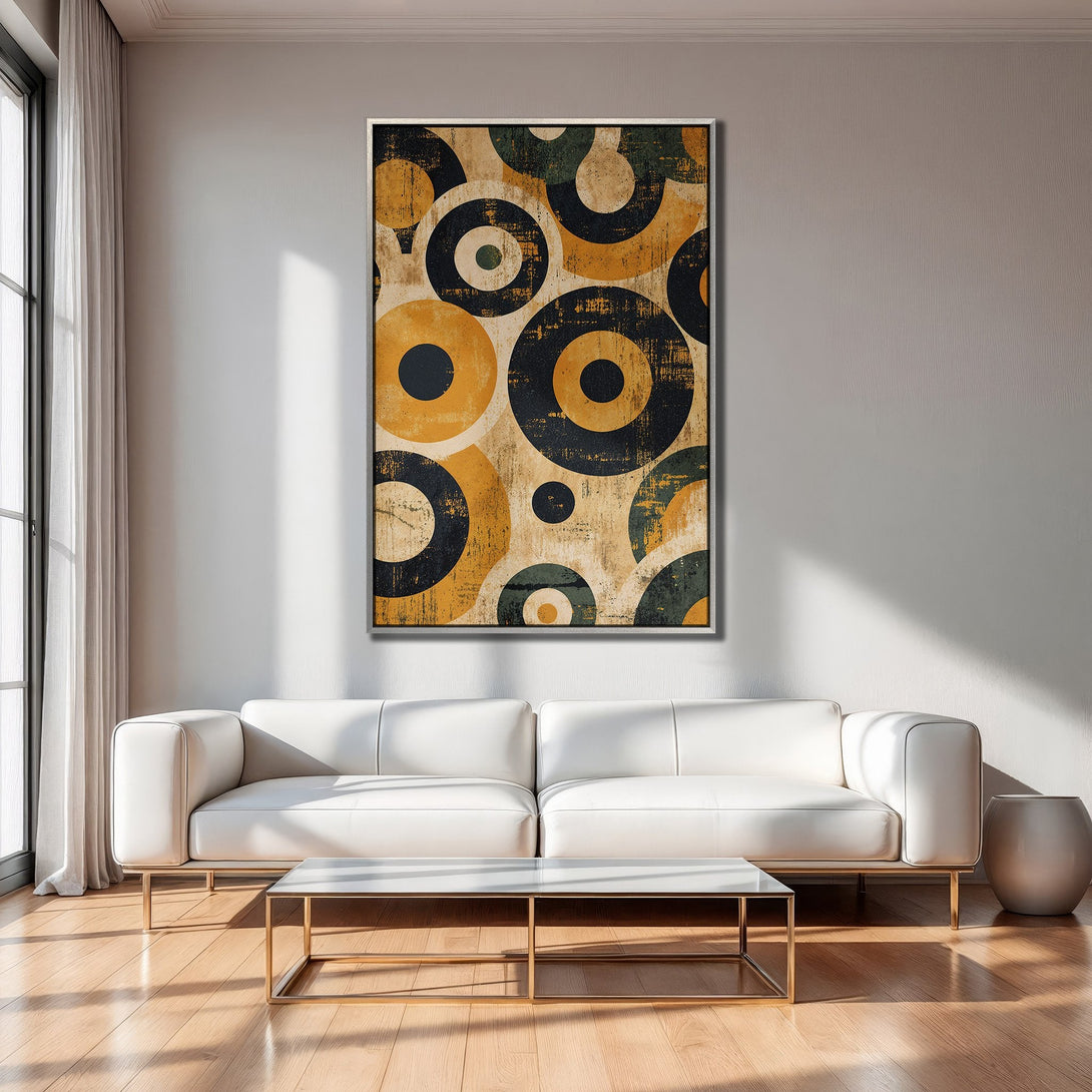Framed Wall Art featuring a retro abstract design with circles in yellow, black, and green tones. Perfect for adding a pop of color to your living room.