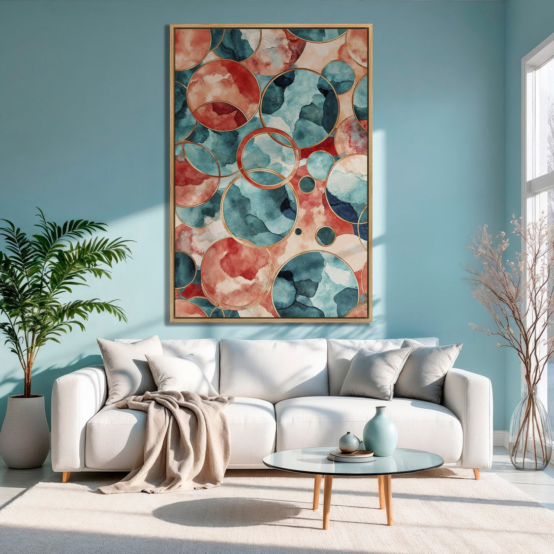 Framed Wall Art featuring abstract watercolor circles in teal, coral, & gold. Modern art perfect for adding a pop of color to your living room.