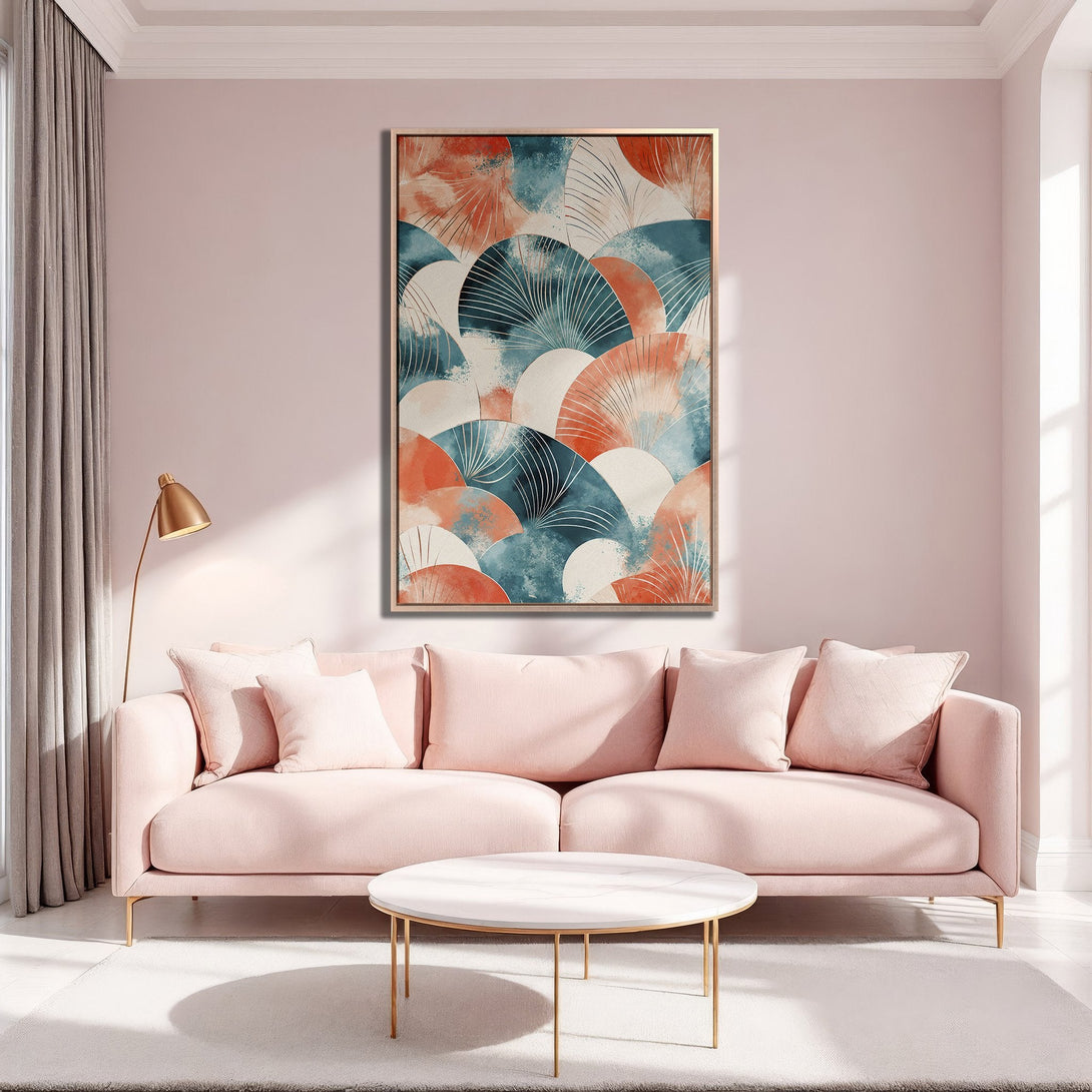 Framed Wall Art featuring an abstract fan design in teal, coral, and white. Modern Canvas Print adds a pop of color to a stylish, blush-toned living room.