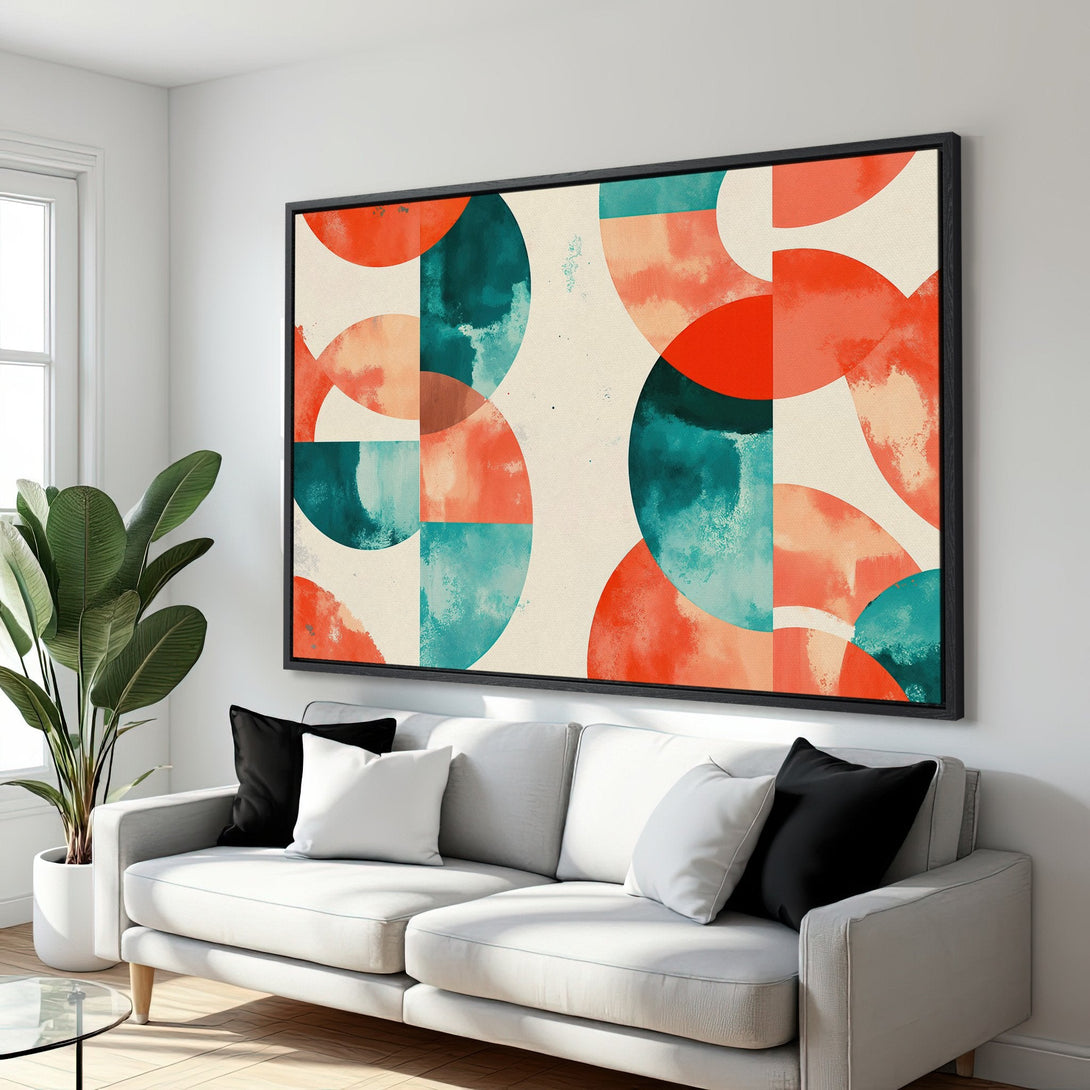 Framed Wall Art featuring a modern abstract design with circles in teal, orange, and beige. Perfect for adding a pop of color to your living room!