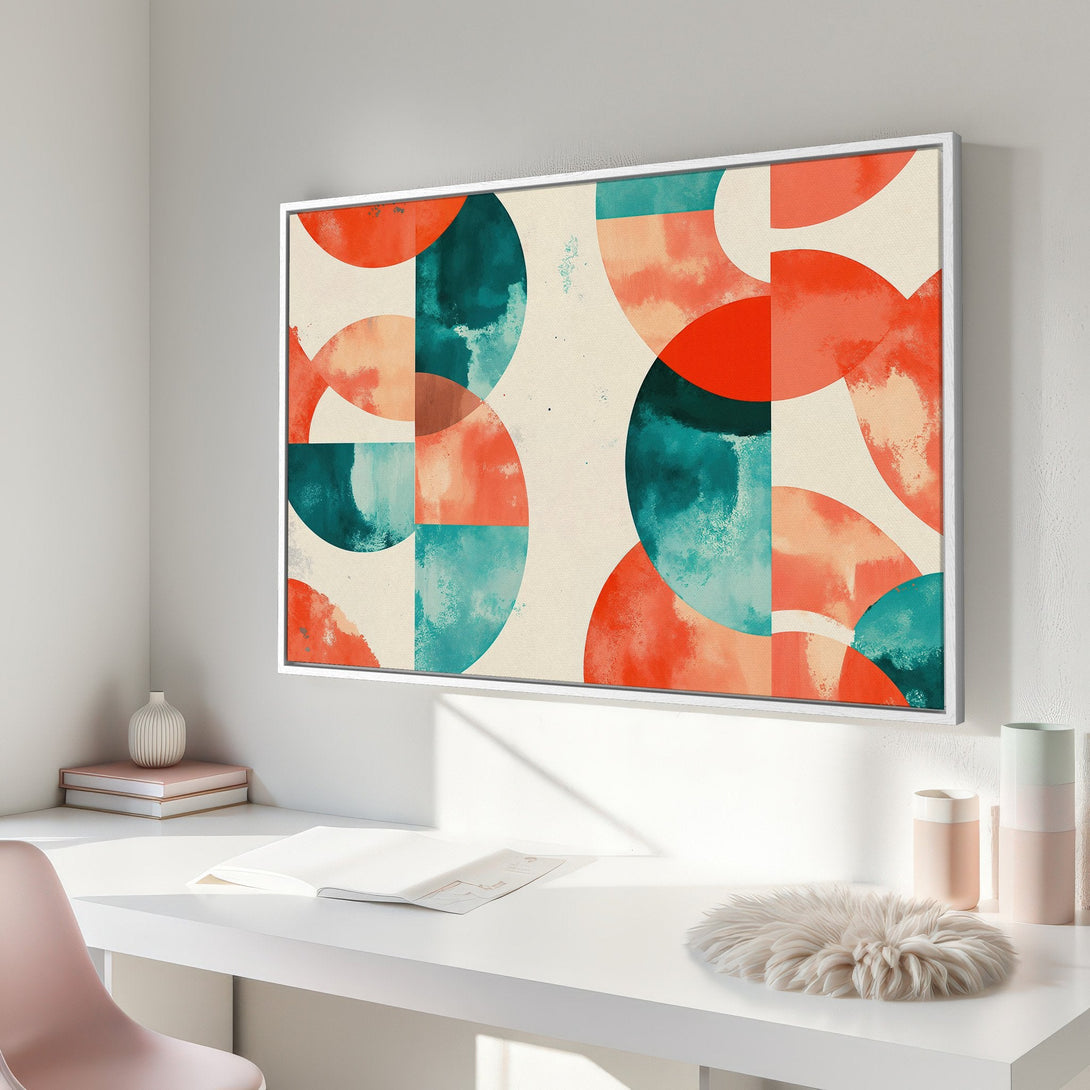 Framed Wall Art featuring a modern abstract design with geometric shapes in vibrant teal, coral, and cream. Perfect for adding a pop of color to any space!