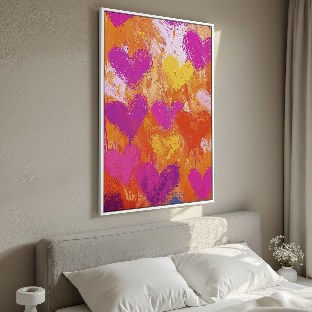Framed Wall Art: Abstract heart painting in vibrant orange, pink, and yellow. Modern art canvas print adds a pop of color to bedroom decor.
