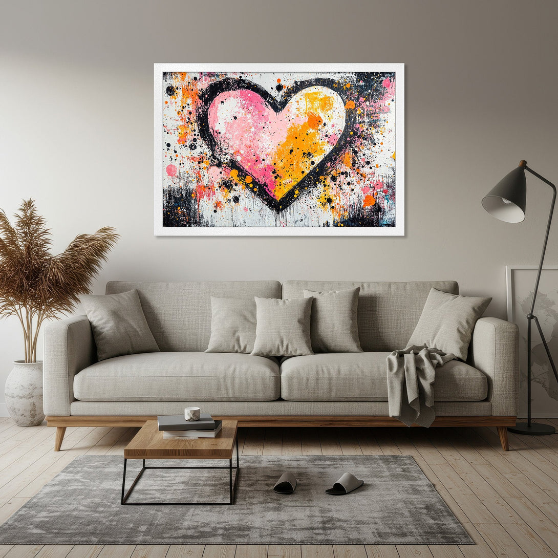 Framed Poster featuring a colorful abstract heart. Modern art style with pink, orange, and black splatter on a white background. Perfect wall art!