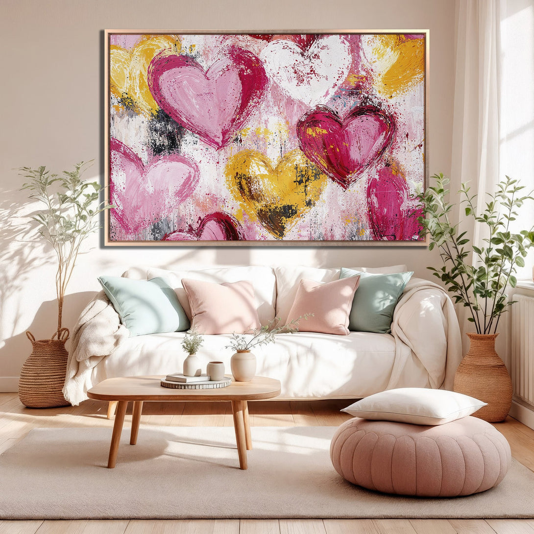 Framed Wall Art featuring abstract hearts in pink, yellow, and white. Modern, romantic art for your home. Add love and color to your space!