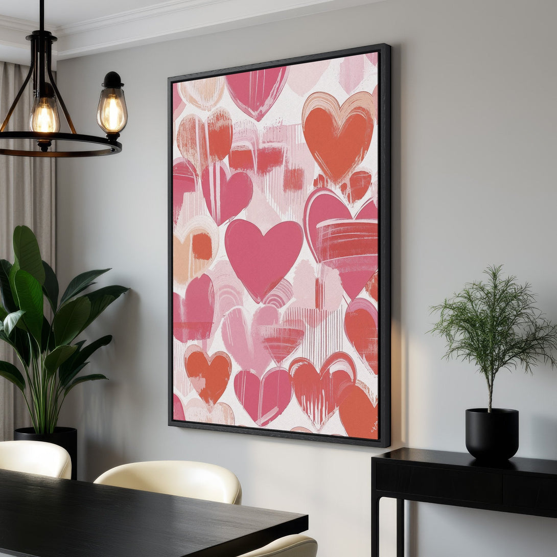 Framed Wall Art featuring a vibrant, abstract heart design in shades of pink and red. Perfect for adding a pop of color and love to any space!