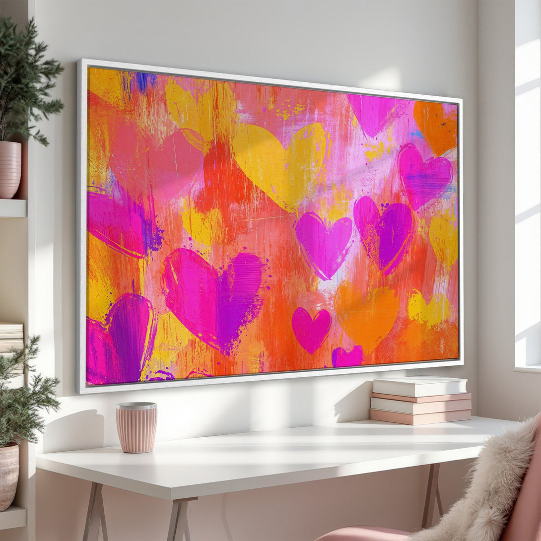 Framed Wall Art: Abstract heart painting in vibrant pink, orange, and yellow hues. Modern art for a stylish interior. Add love to your walls!