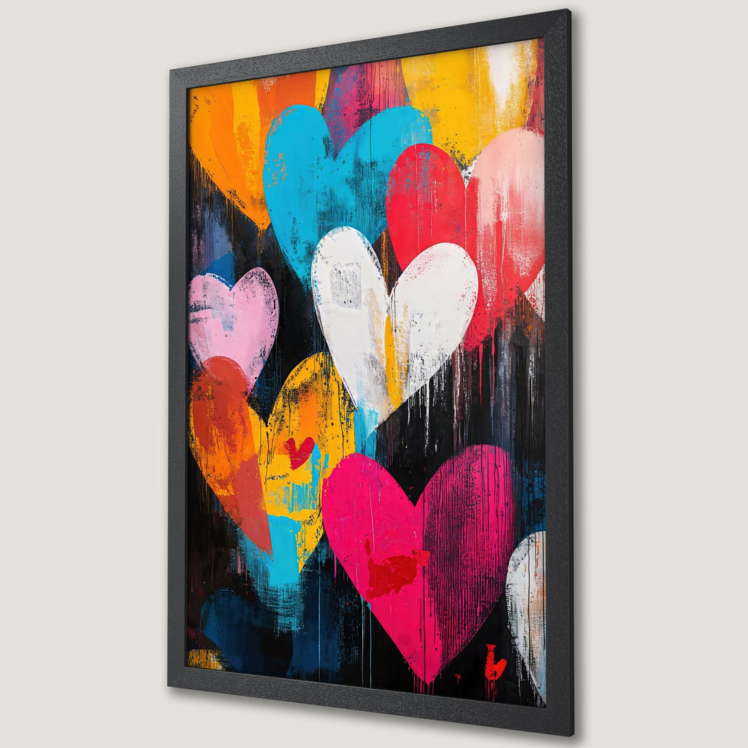 Framed Poster featuring colorful heart art. Modern abstract style with vibrant hues of pink, blue, orange, and yellow on a black background.