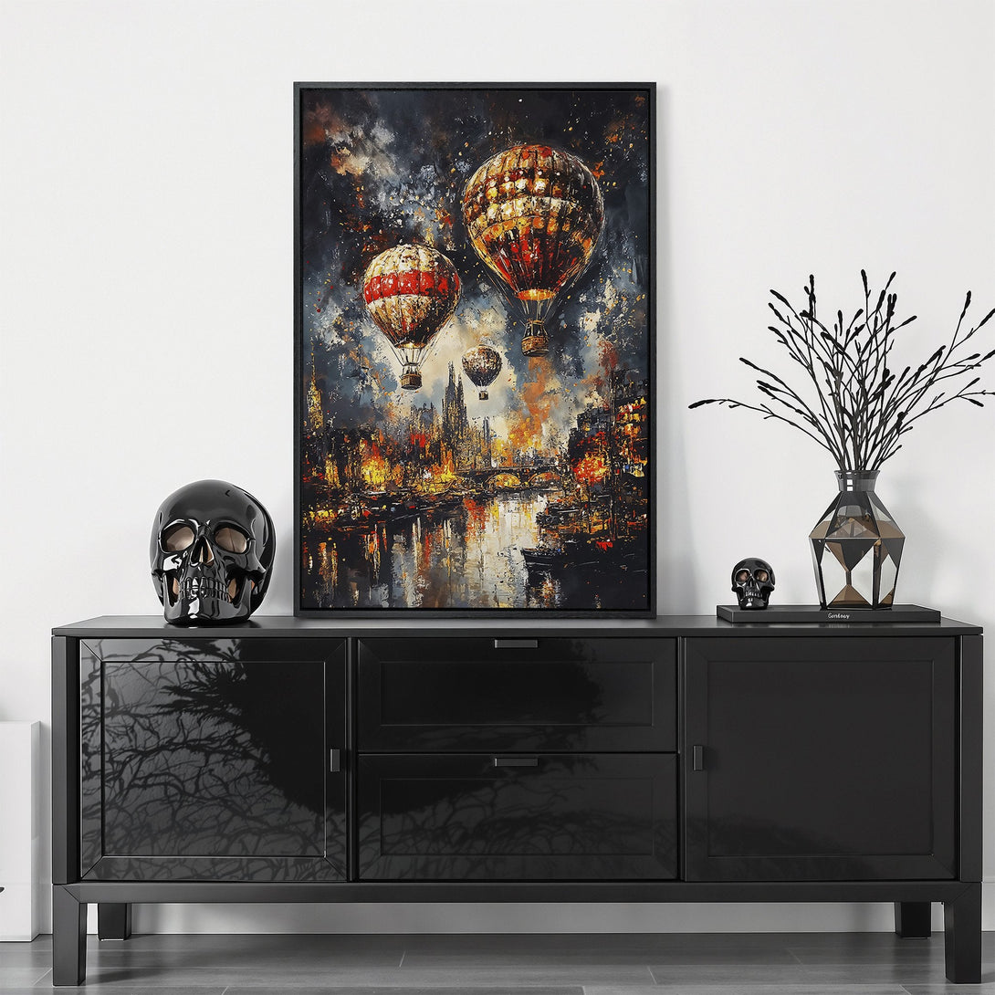 Framed Wall Art featuring hot air balloons over a city, with a dark, moody color palette of blues, oranges, and blacks. Perfect for adding a touch of art!