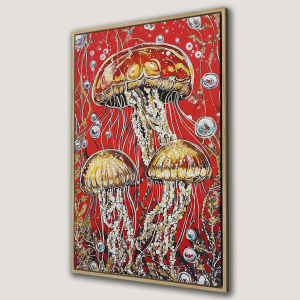 Framed Wall Art featuring vibrant jellyfish on a red background. Modern abstract style with a warm, golden, and red color palette. Perfect for coastal decor!