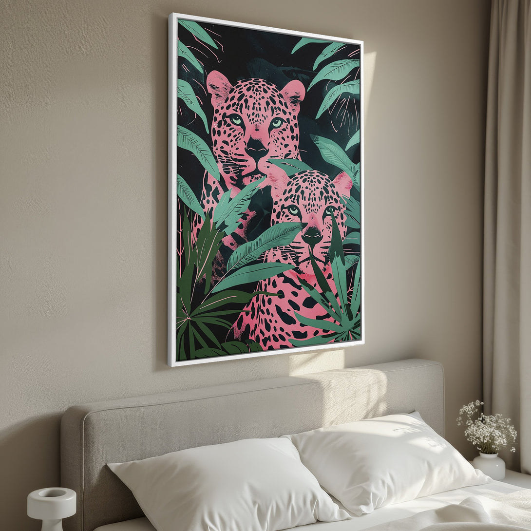 Framed Wall Art featuring a pink leopard in a jungle setting. Modern style with a vibrant pink, green, and black color palette. Perfect for adding a pop of color!