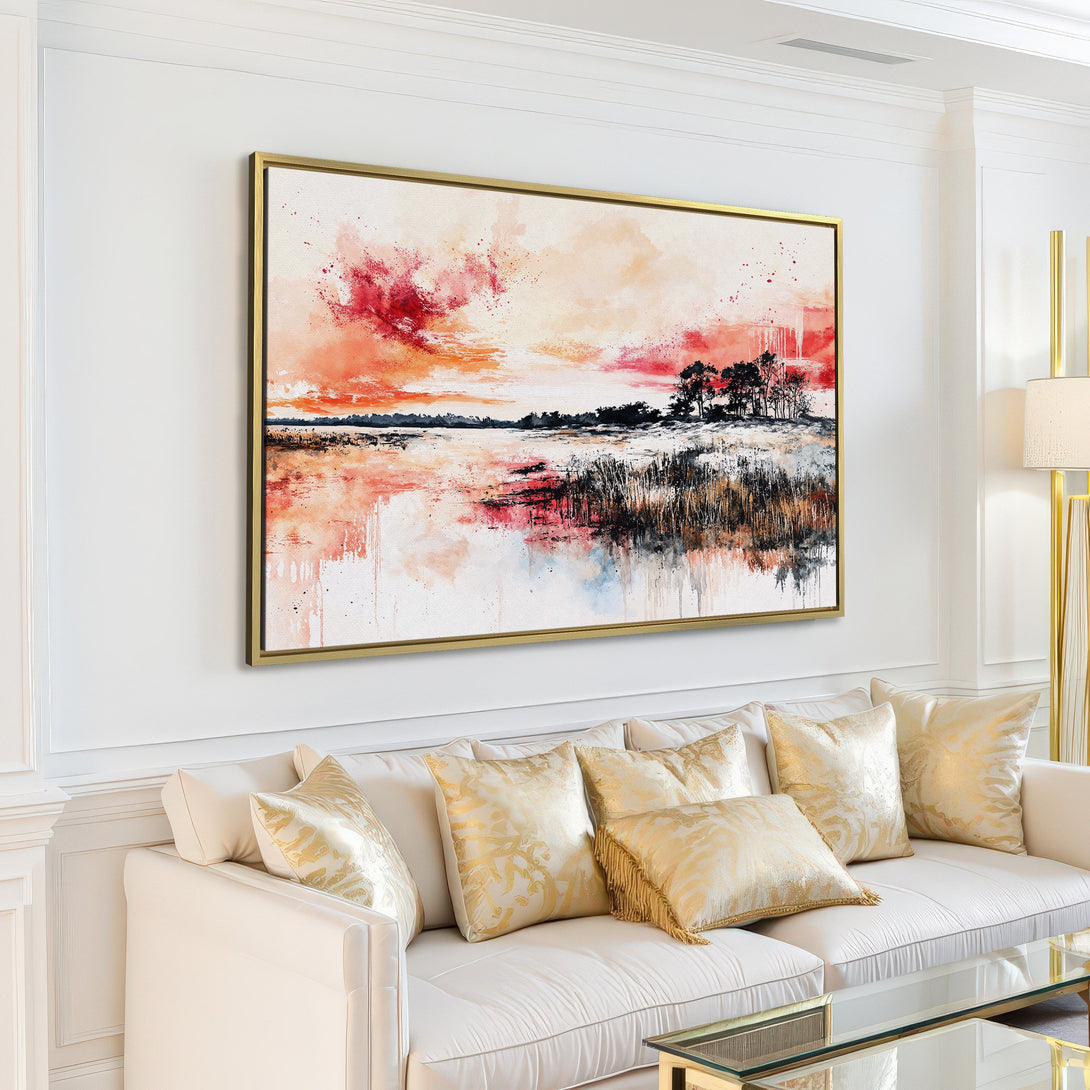 Canvas Print of a landscape painting with a red and orange sunset, modern style, displayed in a bright living room.