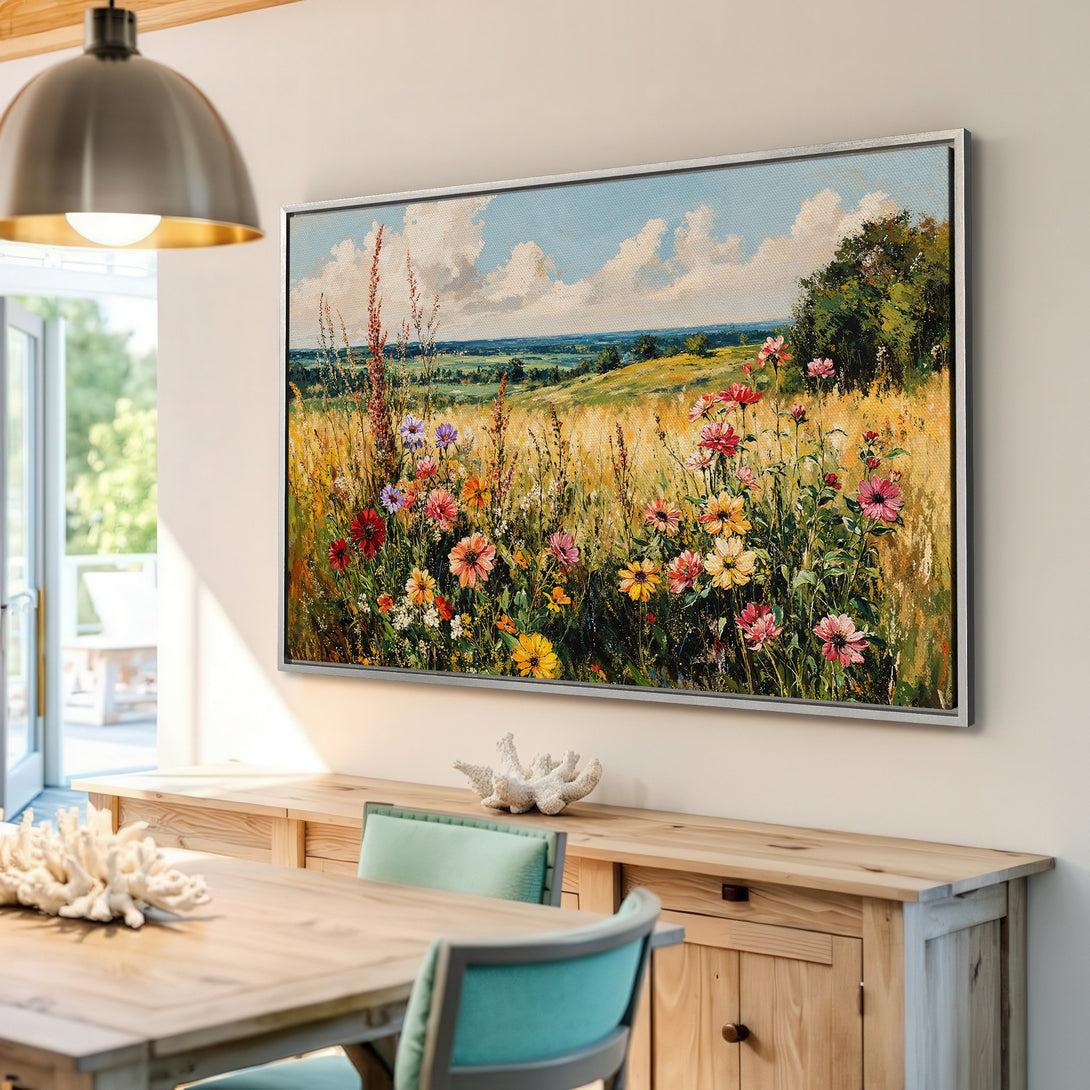 Framed Wall Art: Impressionistic landscape Canvas Print with wildflowers, golden fields, and blue sky. Adds a pop of color to any interior.