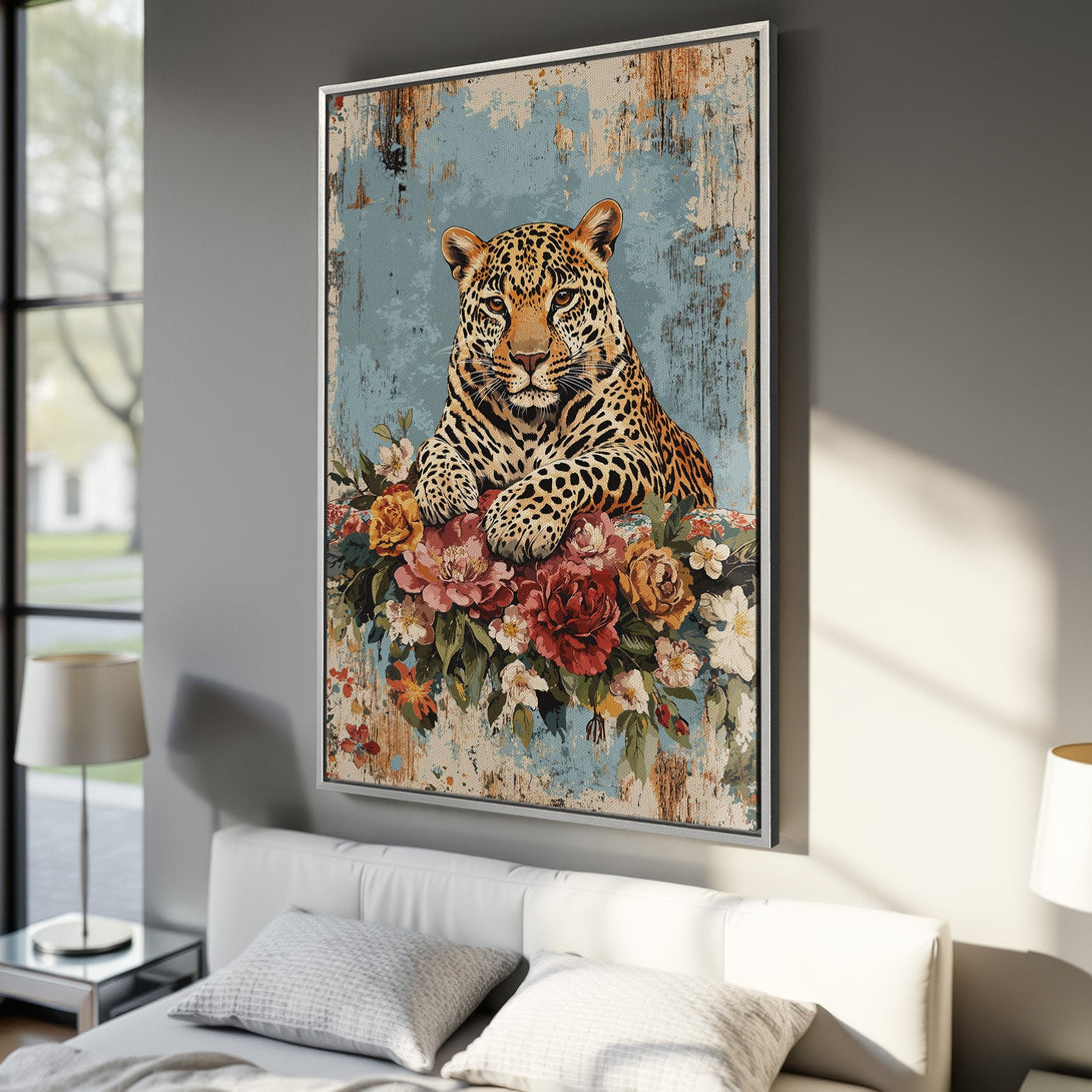 Framed Wall Art: Leopard Canvas Print with floral accents. Rustic style, featuring warm earth tones, blues, and pops of red. Perfect for adding a touch of nature to your decor.