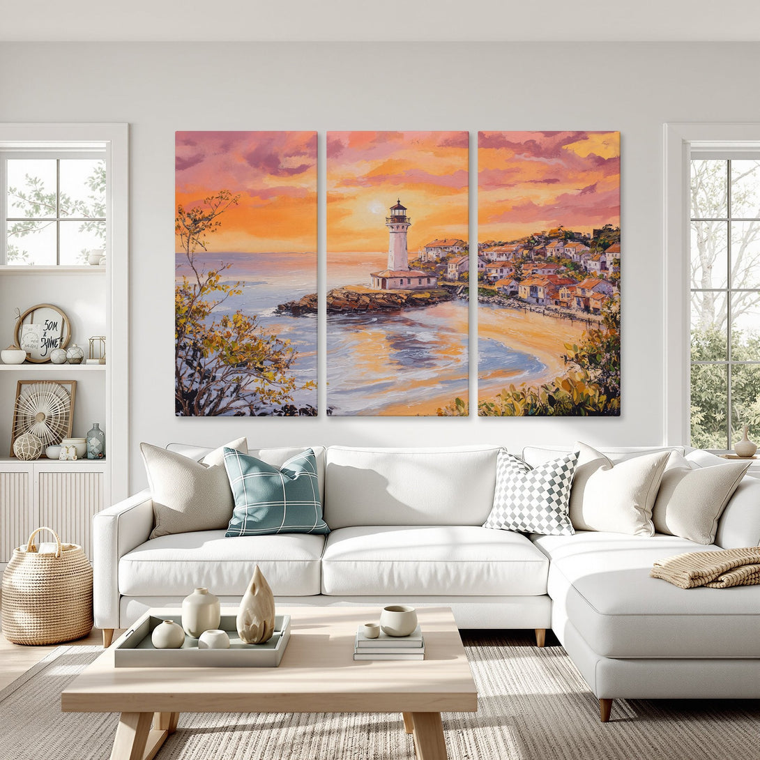 Canvas Print of a coastal lighthouse scene in warm orange and pink tones, perfect wall art for a serene living room.