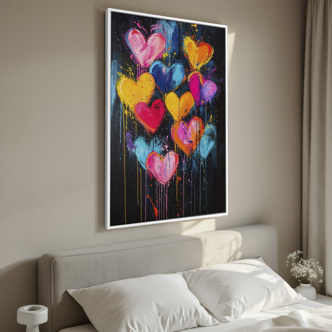 Framed Wall Art: Colorful heart painting in a modern, abstract style. Vibrant pink, yellow, blue, and orange hues on a black background. Perfect bedroom decor.