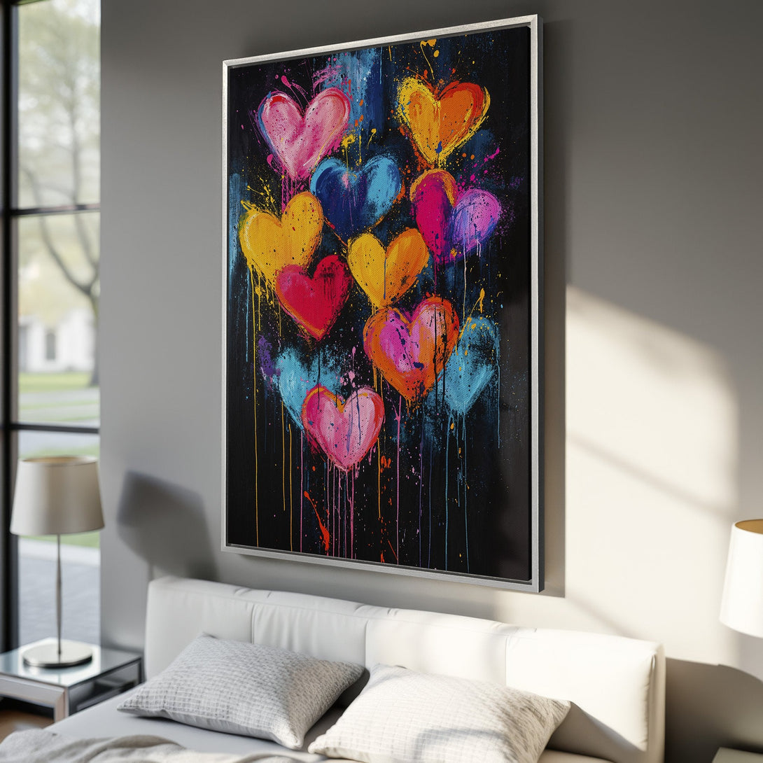 Framed Wall Art featuring colorful heart painting in an abstract style. Vibrant pink, yellow, blue, and orange hearts on a black background. Perfect for modern decor.