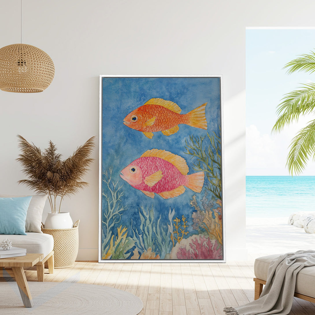 Framed Wall Art: Watercolor fish painting in a coastal interior. Blue, orange, and pink color palette for a serene, beachy vibe. Perfect home decor!