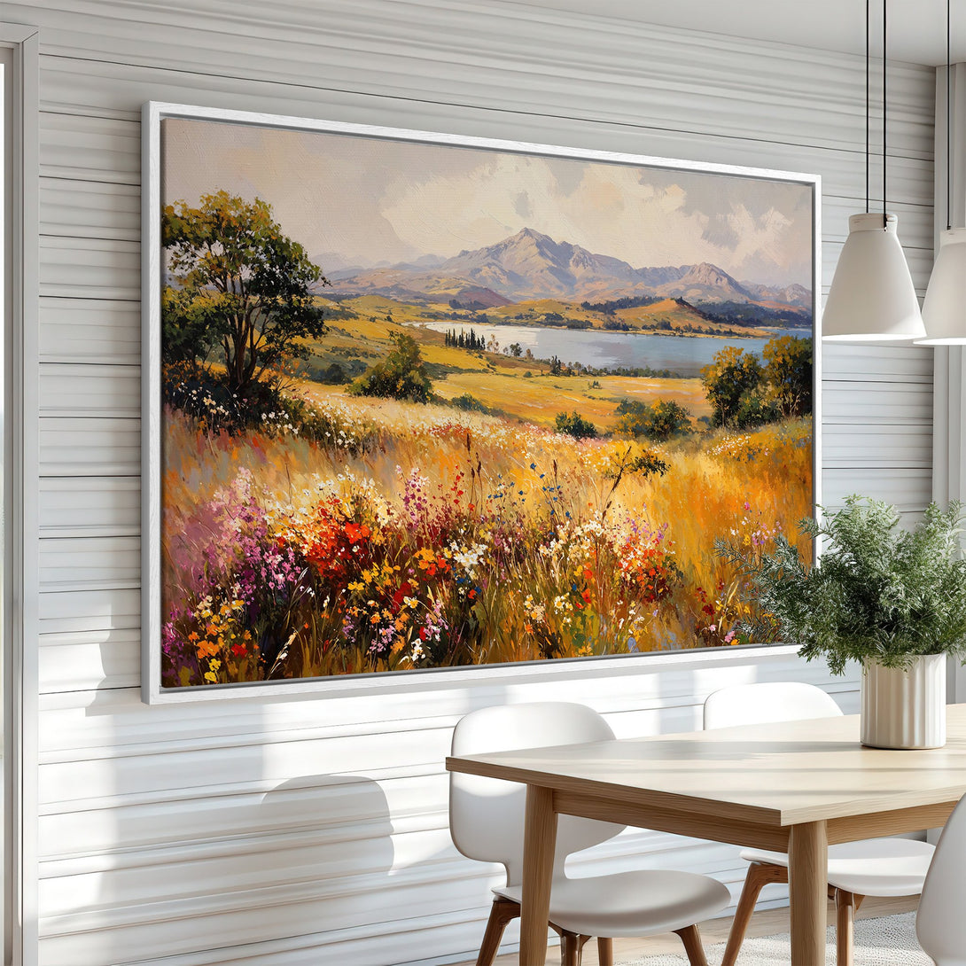 Framed Wall Art: Landscape painting with vibrant wildflowers, warm yellow & orange tones, and a serene mountain view. Perfect for adding a touch of nature to your home.