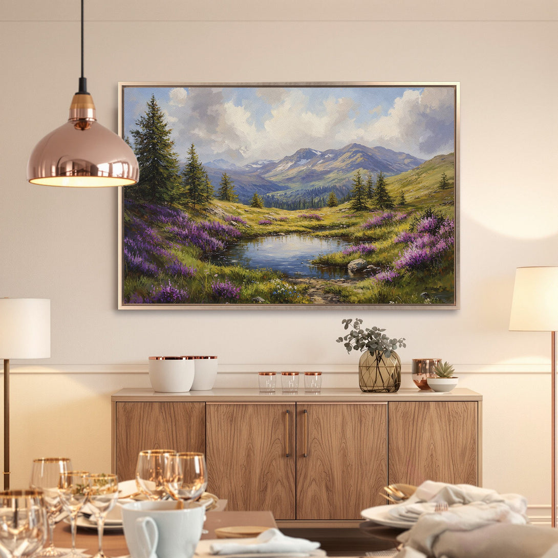 Framed Wall Art: Serene landscape Canvas Print with mountains, lake, and purple wildflowers. Earthy tones with pops of vibrant color for a calming interior.