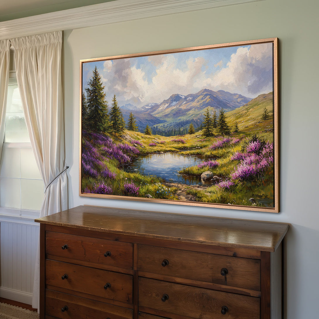 Framed Wall Art: Landscape Canvas Print with vibrant purple flowers, mountains, and a serene lake. Earthy tones and impressionistic style. Perfect home decor.