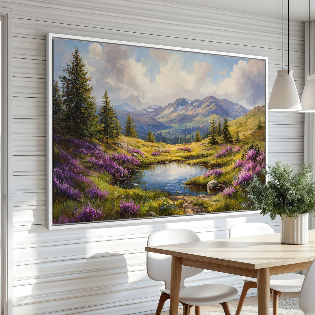 Framed Wall Art: Landscape painting of a serene mountain lake with vibrant purple flowers, green trees, and a calming blue and green color palette. Perfect home decor!