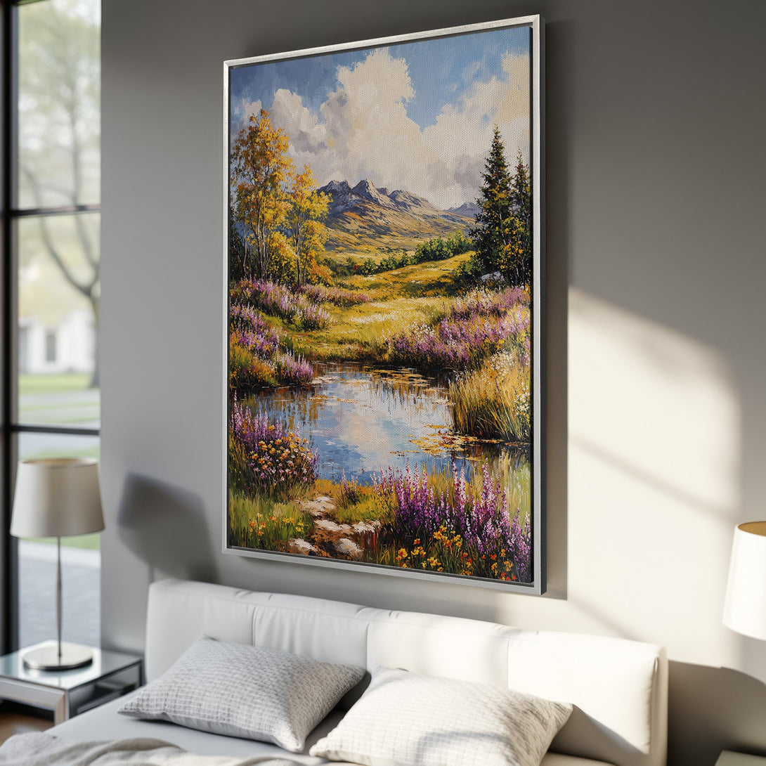 Framed Wall Art: Landscape Canvas Print with vibrant wildflowers, a serene lake, and mountains. Warm yellow, purple, and blue color palette. Perfect for home decor.