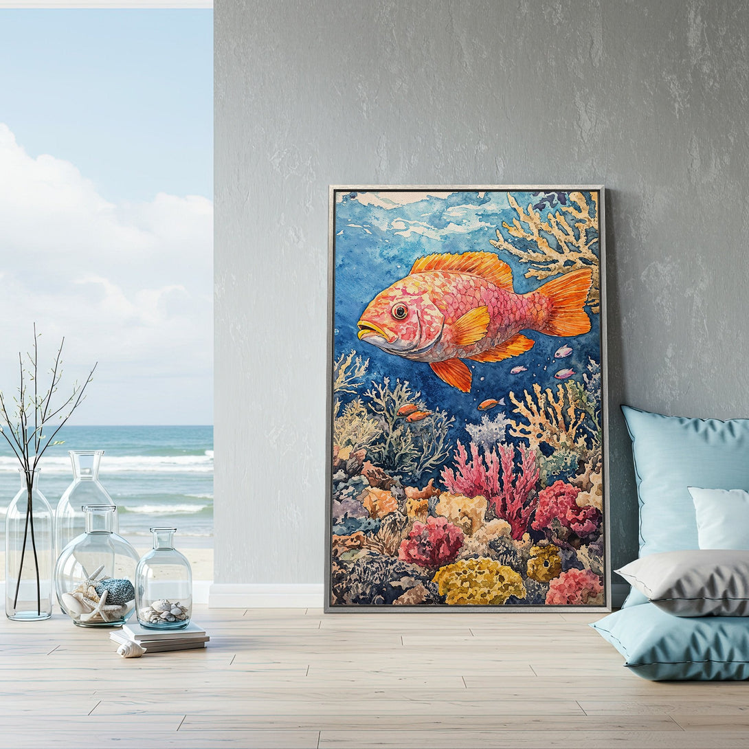 Framed Wall Art of a vibrant watercolor fish and coral reef. Coastal decor with a blue, orange, and pink color palette. Perfect for adding a pop of color!