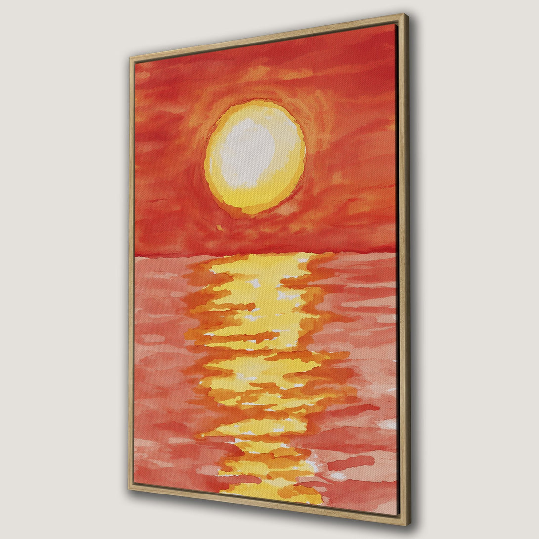 Framed Wall Art featuring a watercolor sunset over water. Warm, vibrant orange and yellow hues create a calming and artistic aesthetic for your home.