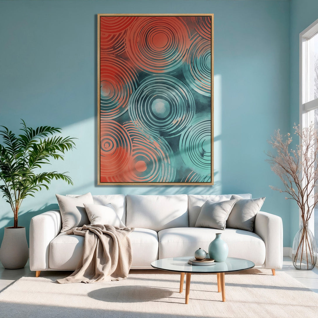 Framed Wall Art featuring abstract circles in coral and teal. Modern home decor with a calming color palette. Perfect for living rooms!