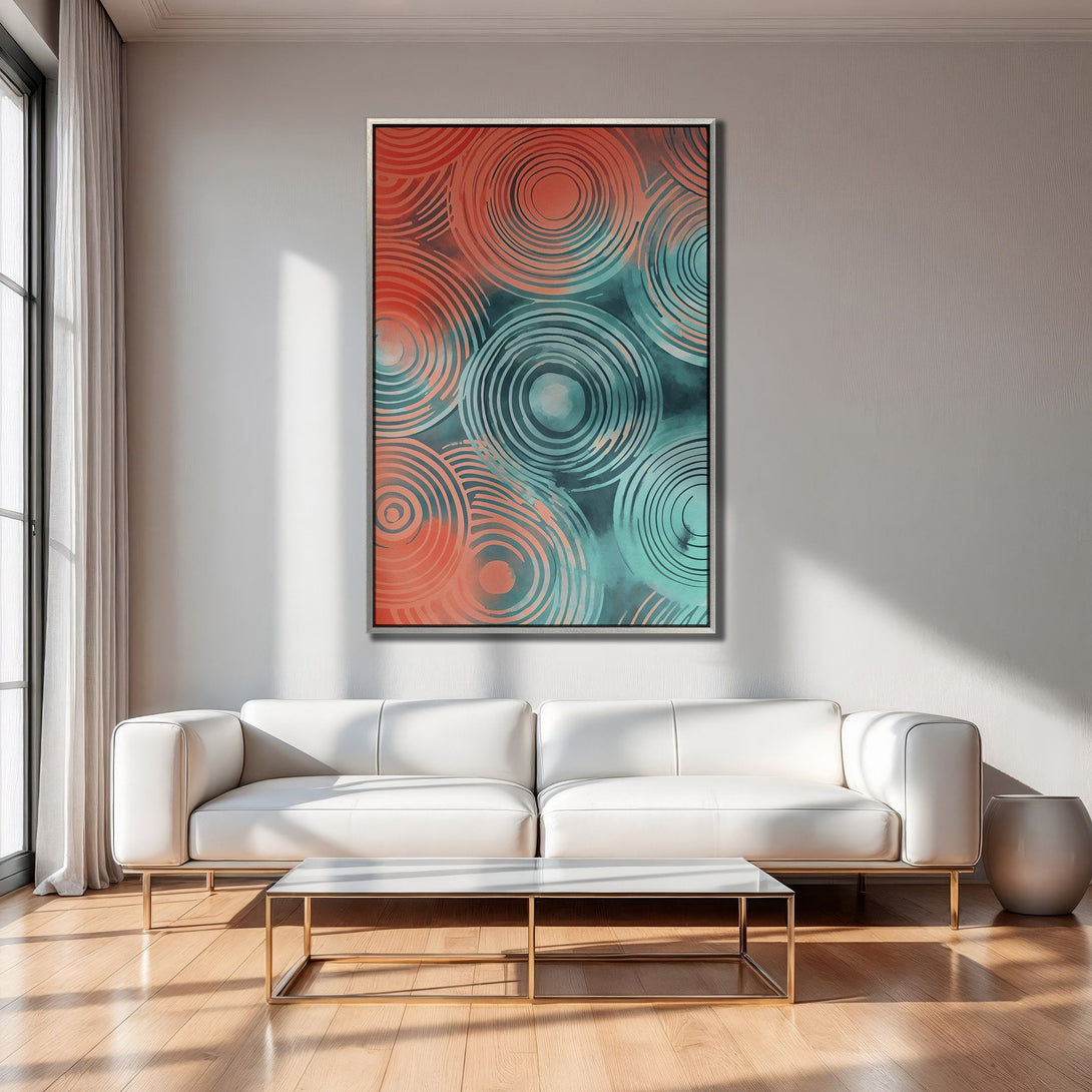 Framed Wall Art featuring abstract circles in teal and coral. Modern art canvas print adds a pop of color to any interior.