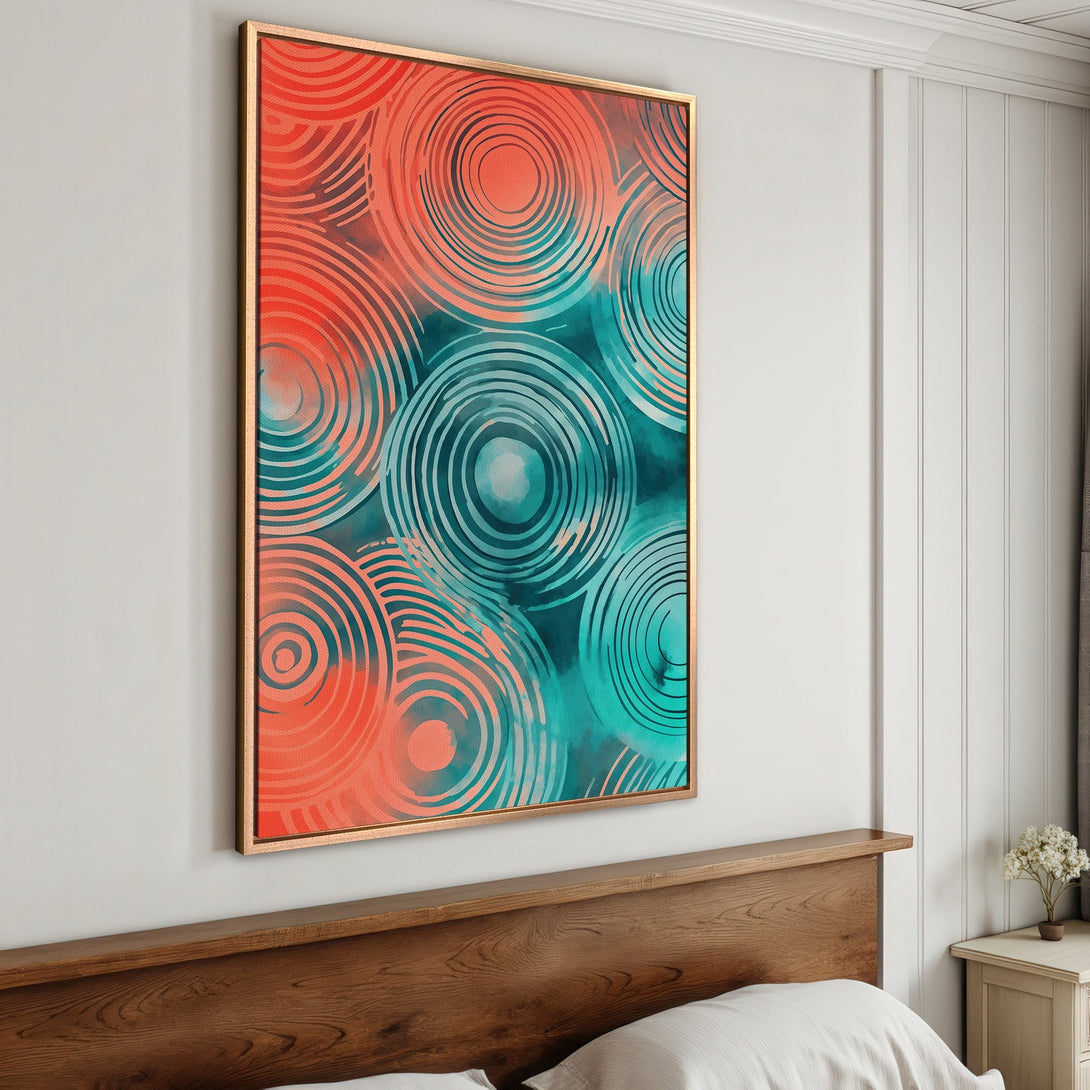 Framed Wall Art featuring abstract circles in coral and teal hues. Modern art canvas print adds a pop of color to any bedroom decor.