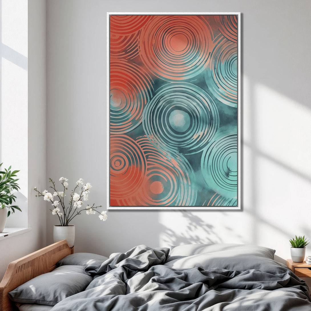 Framed Wall Art featuring abstract circles in teal and coral hues. Modern art canvas print adds a pop of color to any bedroom decor.