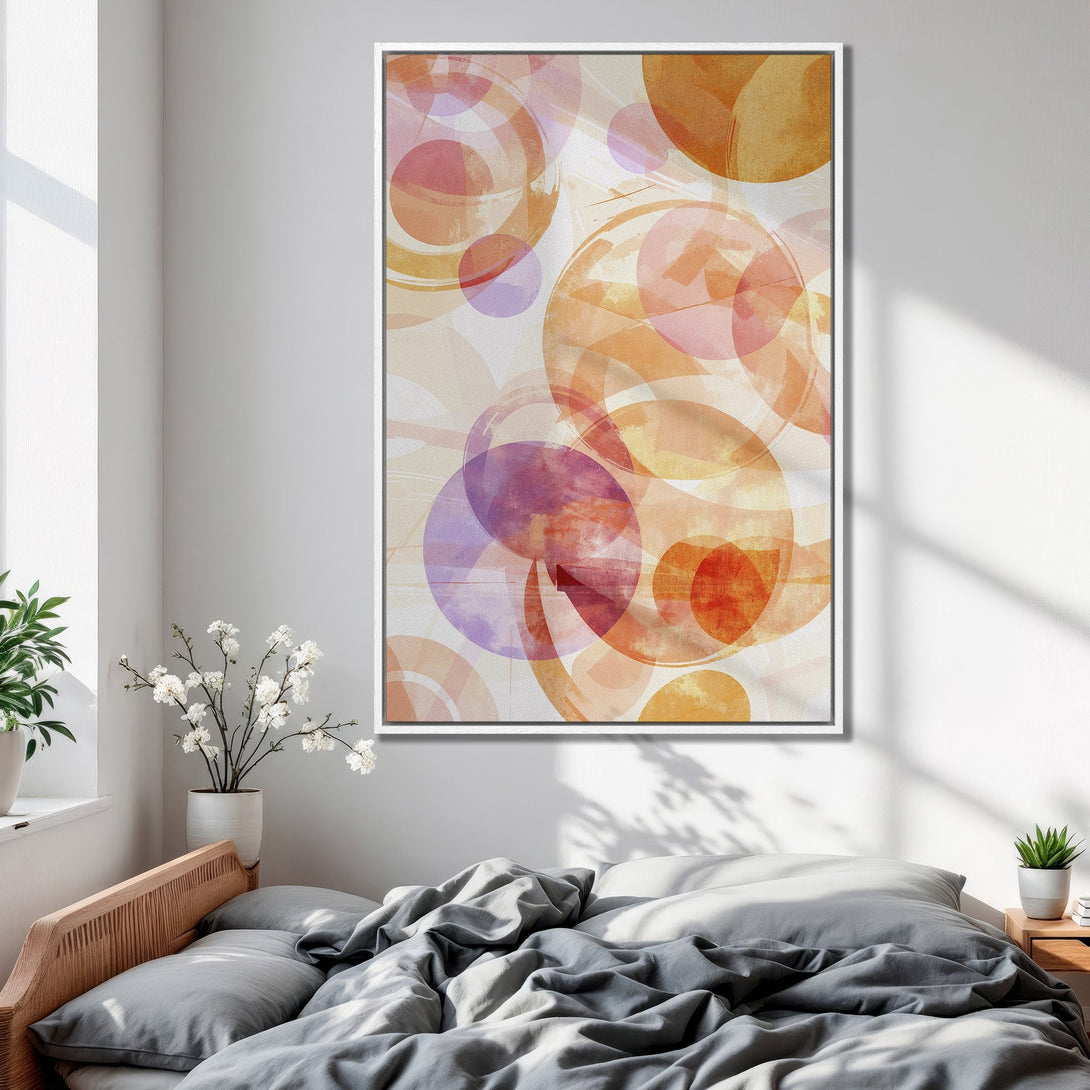 Framed Wall Art featuring abstract watercolor circles in warm orange, pink, and purple hues. Modern art for bedroom decor.