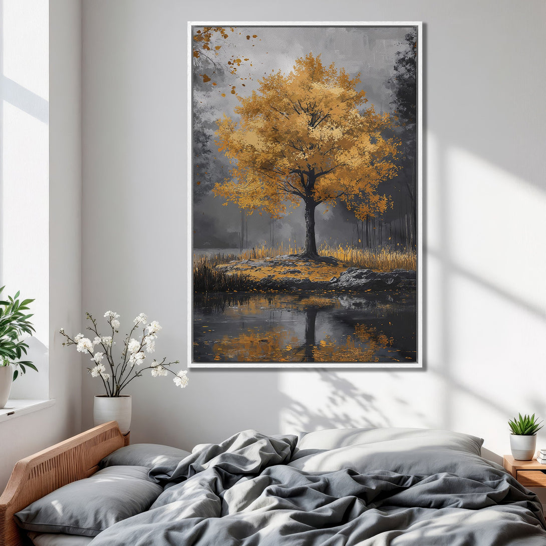 Framed Wall Art featuring an autumn landscape painting with a golden tree, in a neutral gray and gold color palette. Perfect for bedroom decor.