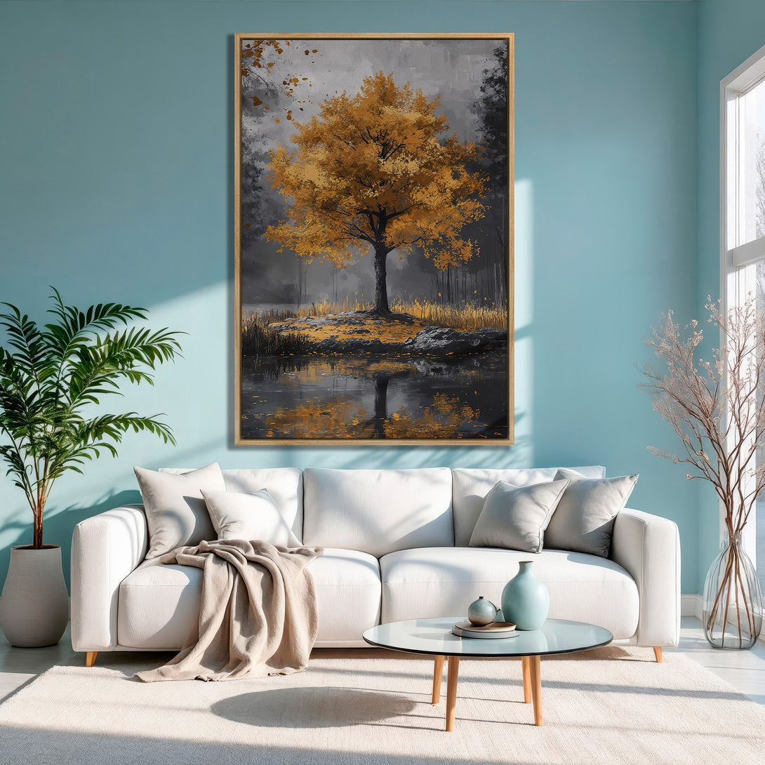 Framed Wall Art: Golden tree landscape canvas print in a modern living room. Features a nature-inspired, abstract style with gold, gray, and blue tones.