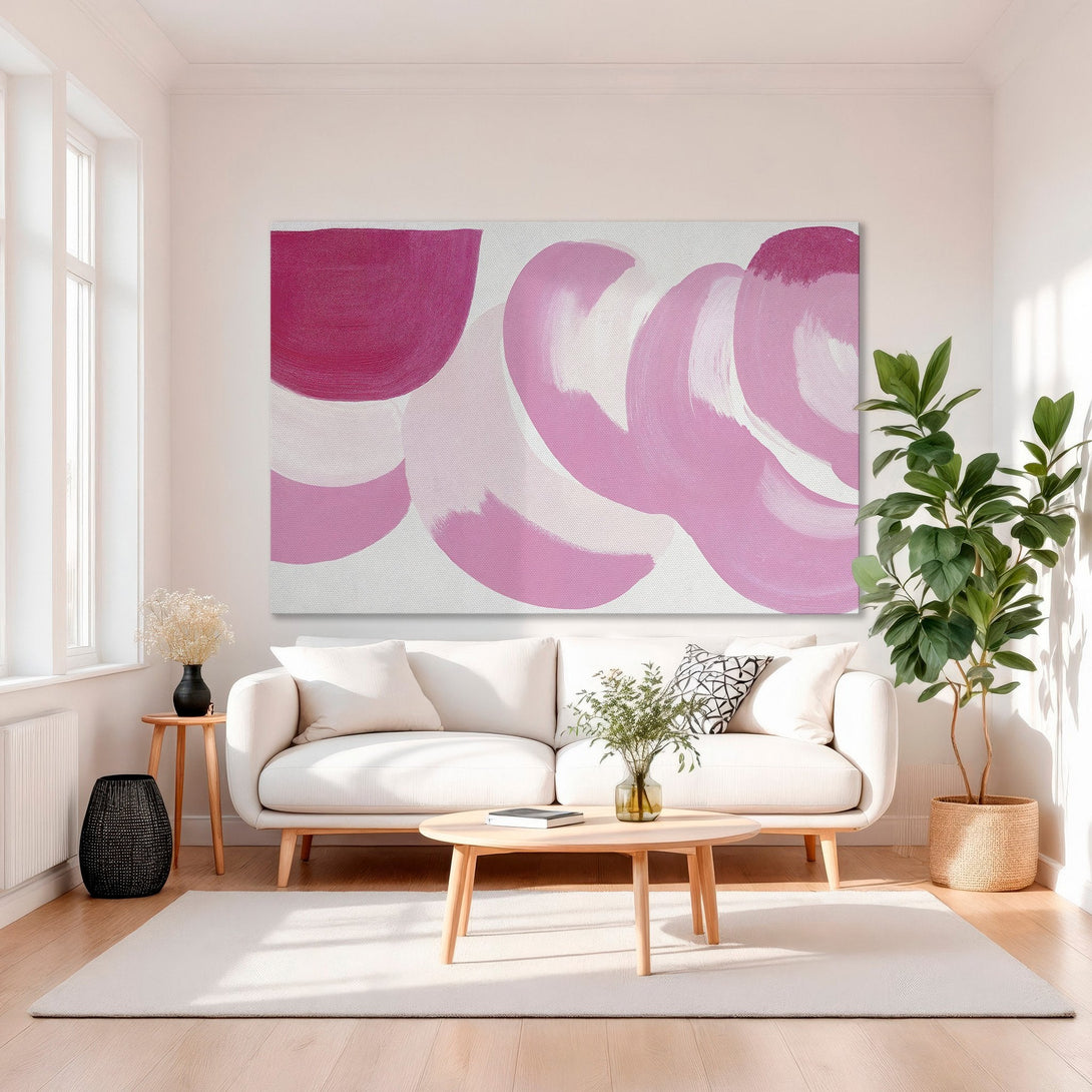 Framed Wall Art featuring abstract pink brushstrokes. Modern art with a vibrant pink and white color palette, perfect for adding a pop of color to any space.