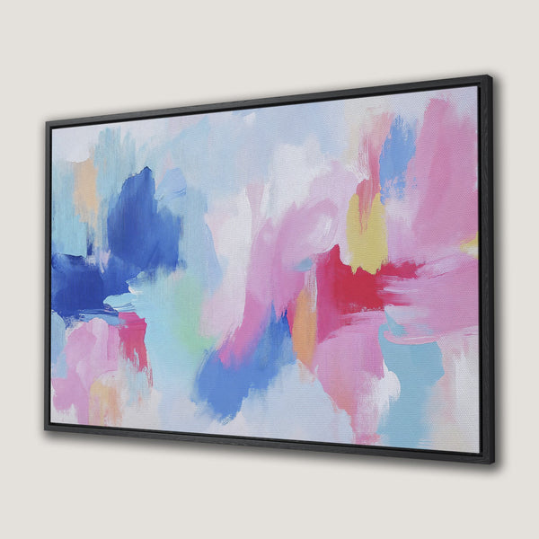 Framed Wall Art featuring an abstract painting with a pastel color palette of pink, blue, and yellow. Perfect for adding a pop of color to any space.