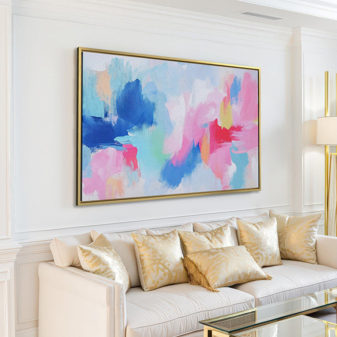 Abstract Canvas Print in a modern living room, featuring a colorful palette of pink, blue, and yellow. Perfect wall art for a stylish home.