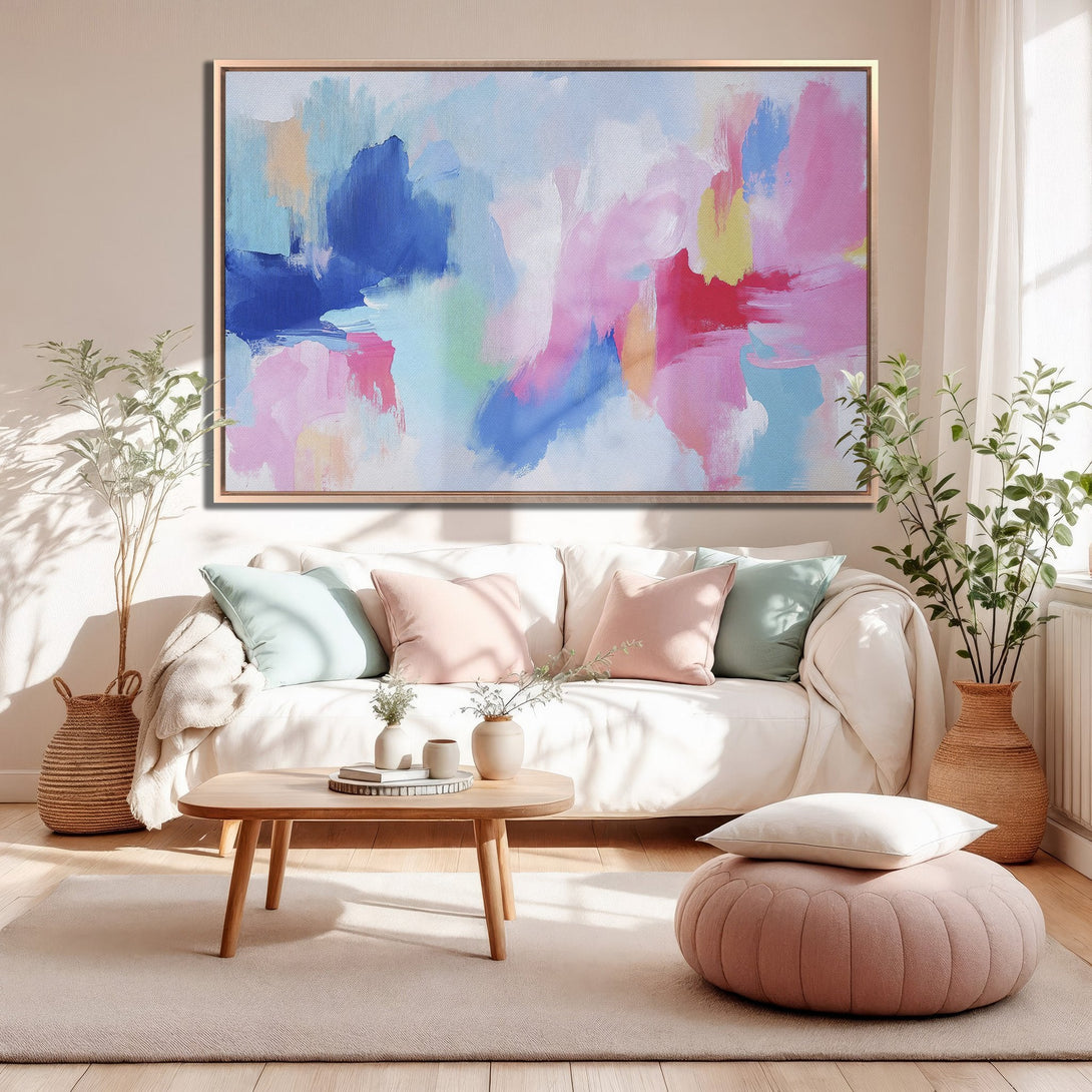 Framed Wall Art Canvas Print, abstract art in blues, pinks, and yellows, perfect for modern home decor. Adds a pop of color to any room.